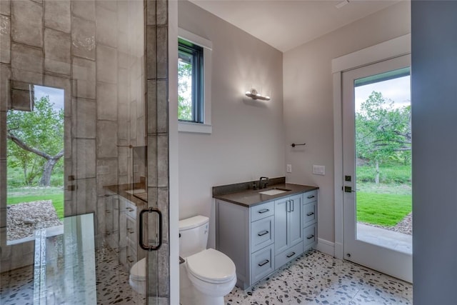 106 Edwards Cir, Horseshoe Bay, TX 78657 - full bathroom with toilet, a stall shower, and vanity