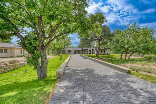106 Edwards Cir, Horseshoe Bay, TX 78657 - view of front of property with a front lawn
