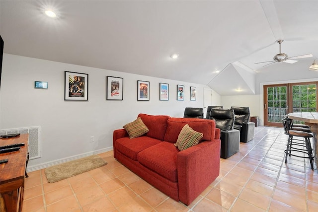 living area featuring lofted ceiling, ceiling fan, recessed lighting, light tile patterned floors, and baseboards