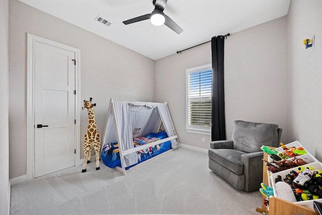 playroom featuring baseboards, a ceiling fan, and carpet floors