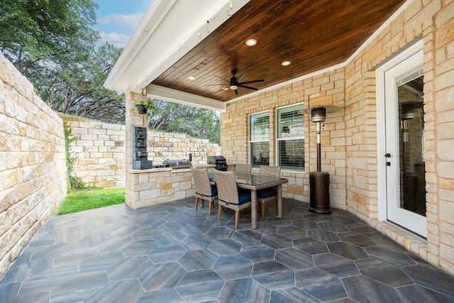 view of patio featuring ceiling fan, a fenced backyard, area for grilling, and outdoor dining area