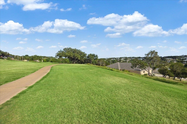 view of home's community featuring a yard