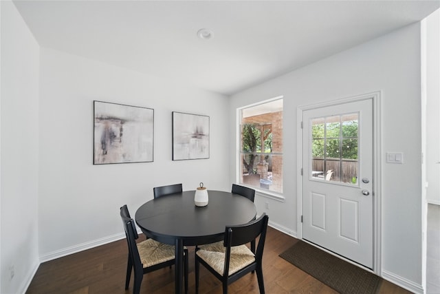 10725 Maelin Dr, Austin, TX 78739 - dining room with dark wood-type flooring and baseboards