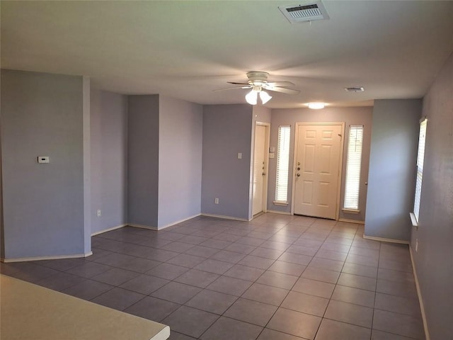 908 Sally Lunn Way, Pflugerville, TX 78660 - foyer with ceiling fan and tile patterned flooring