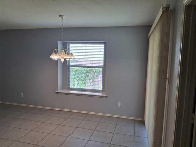 908 Sally Lunn Way, Pflugerville, TX 78660 - empty room featuring a chandelier and baseboards