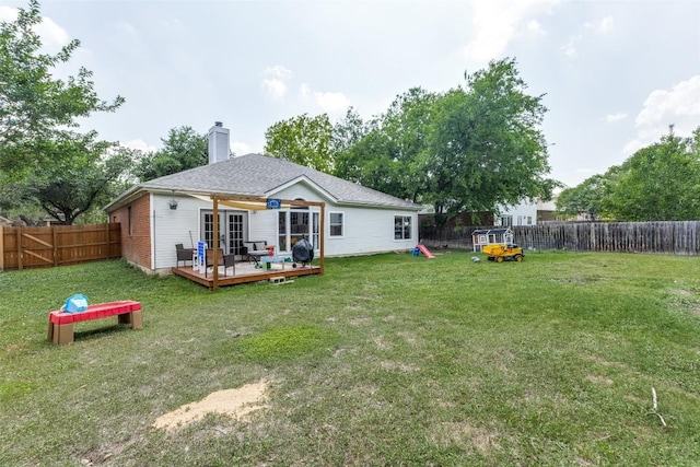 6614 Bramber Ln, Austin, TX 78754 - back of house featuring a wooden deck, a chimney, and french doors