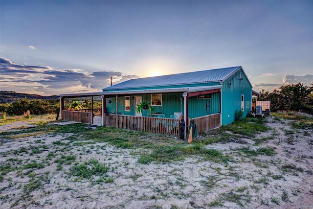 297 White Ranch Rd, Blanco, TX 78606 - view of front of property with a porch and metal roof