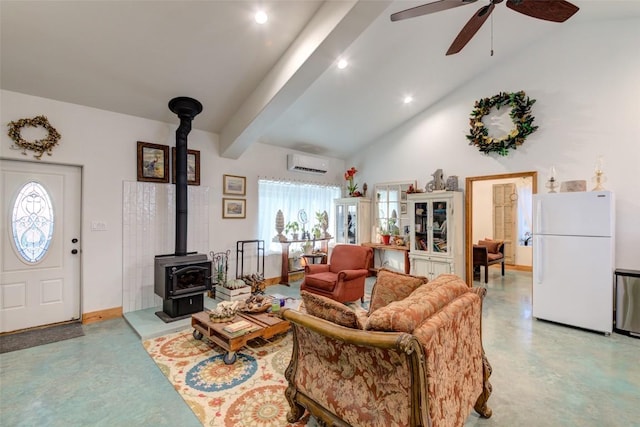 297 White Ranch Rd, Blanco, TX 78606 - living room featuring an AC wall unit, a wood stove, finished concrete floors, ceiling fan, and recessed lighting