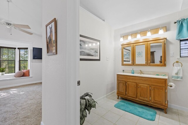 969 N State Highway 95, Bastrop, TX 78602 - bathroom with vanity, ceiling fan, and tile patterned floors