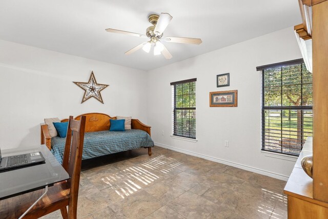 969 N State Highway 95, Bastrop, TX 78602 - bedroom with baseboards and ceiling fan