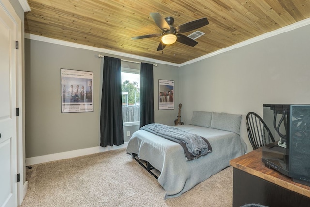 1305 Quail Ravine, Round Rock, TX 78664 - bedroom featuring wooden ceiling, carpet floors, crown molding, baseboards, and ceiling fan