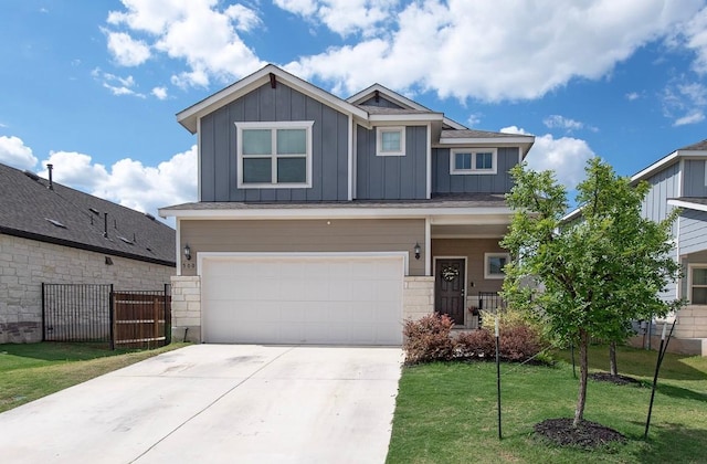 500 Pickrell Loop, Liberty Hill, TX 78642 - craftsman house with board and batten siding, a garage, and driveway