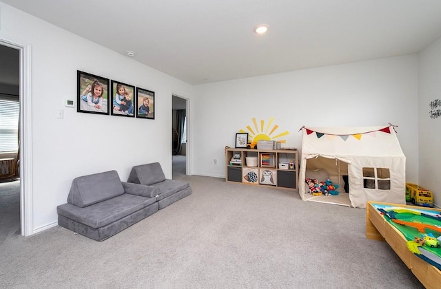 500 Pickrell Loop, Liberty Hill, TX 78642 - sitting room featuring carpet flooring, recessed lighting, and baseboards