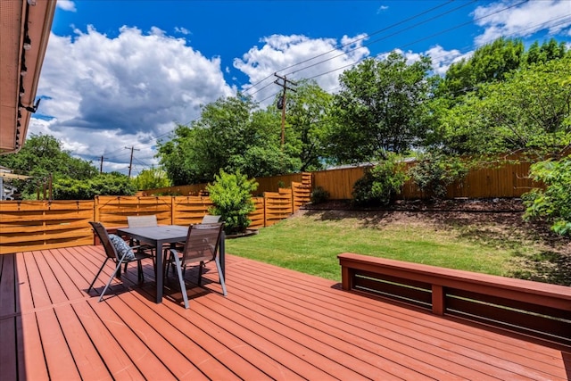 wooden deck with outdoor dining space