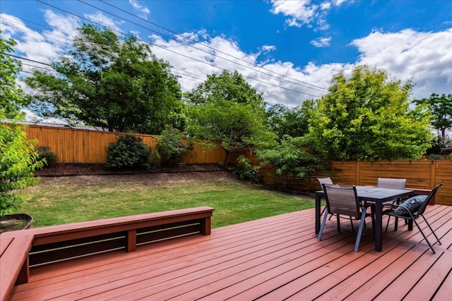 wooden deck with outdoor dining area