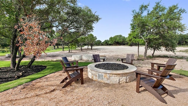 520 Betty Ann Way, Leander, TX 78641 - view of patio featuring an outdoor fire pit
