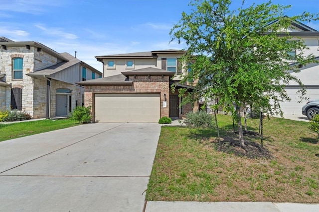 520 Betty Ann Way, Leander, TX 78641 - view of front of house with driveway, an attached garage, a front lawn, and brick siding