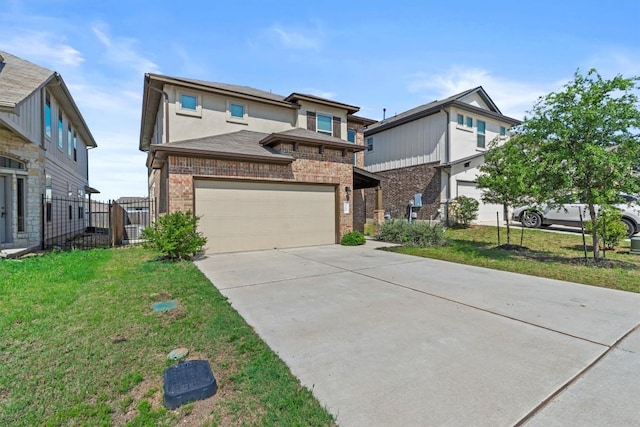 520 Betty Ann Way, Leander, TX 78641 - view of front facade with brick siding, concrete driveway, and an attached garage