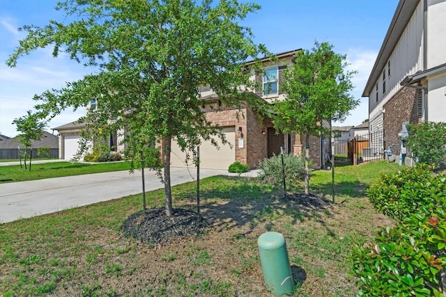 520 Betty Ann Way, Leander, TX 78641 - view of front of house featuring concrete driveway, brick siding, and a garage