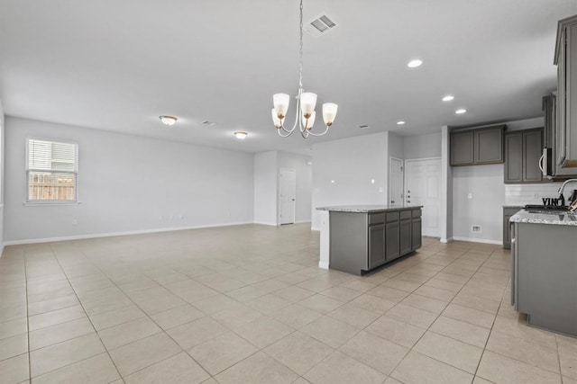 520 Betty Ann Way, Leander, TX 78641 - kitchen featuring a chandelier, decorative light fixtures, recessed lighting, open floor plan, and a sink