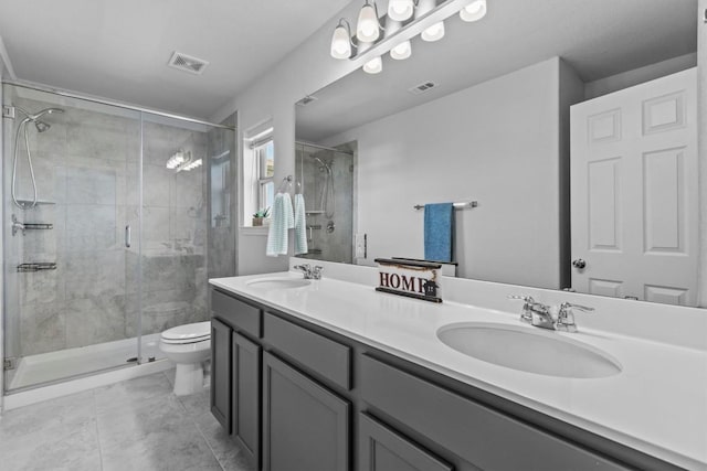 520 Betty Ann Way, Leander, TX 78641 - full bath featuring double vanity, toilet, and a shower stall