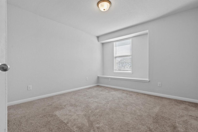 520 Betty Ann Way, Leander, TX 78641 - carpeted spare room featuring baseboards