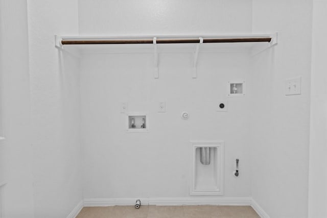 520 Betty Ann Way, Leander, TX 78641 - laundry room with gas dryer hookup, hookup for an electric dryer, washer hookup, and baseboards