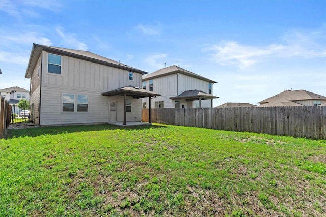 520 Betty Ann Way, Leander, TX 78641 - rear view of property featuring board and batten siding and a patio area