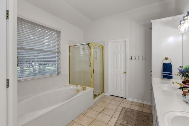 420 Oak Forest Dr, Buda, TX 78610 - bathroom featuring a bath, a stall shower, tile patterned flooring, and double vanity