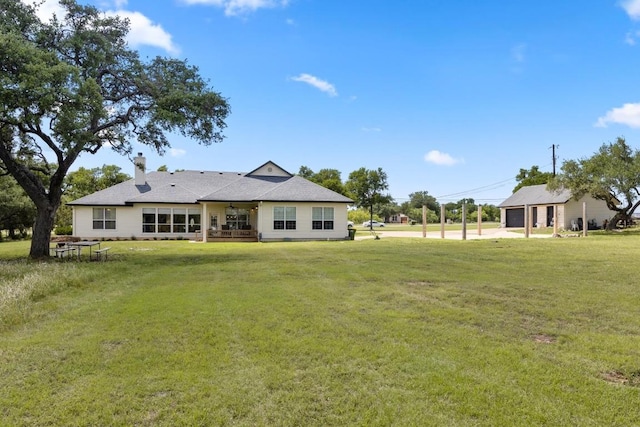 420 Oak Forest Dr, Buda, TX 78610 - rear view of house with a yard and a chimney