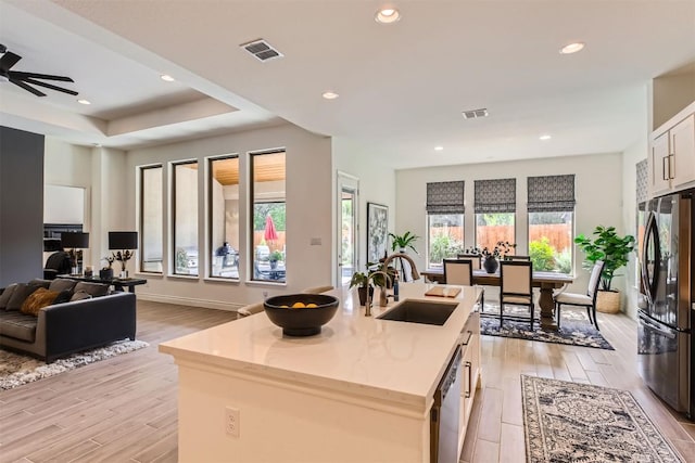 25727 Madison Rnch, San Antonio, TX 78255 - kitchen with appliances with stainless steel finishes, a sink, plenty of natural light, open floor plan, and recessed lighting