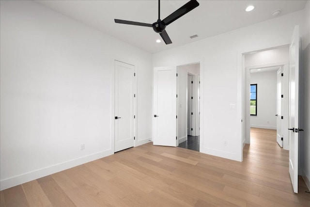 1754 County Road 146th Rd, Georgetown, TX 78633 - unfurnished bedroom featuring light wood finished floors, recessed lighting, and a ceiling fan