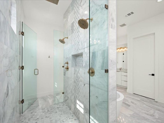 1754 County Road 146th Rd, Georgetown, TX 78633 - bathroom with a marble finish shower, a soaking tub, and vanity
