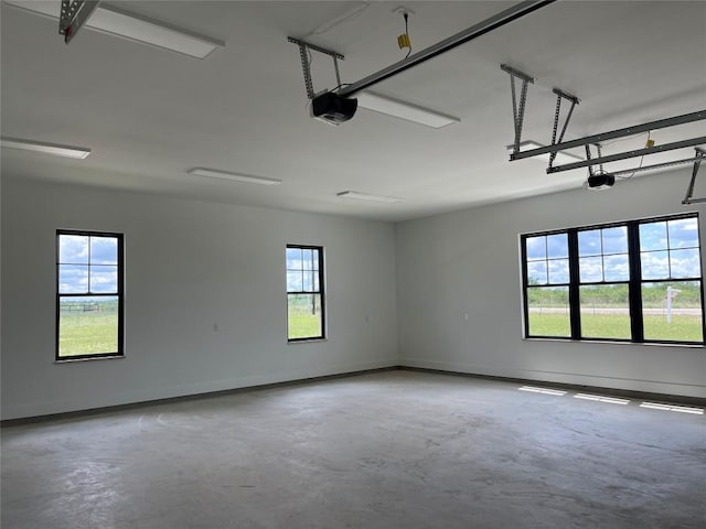 1754 County Road 146th Rd, Georgetown, TX 78633 - garage with a garage door opener