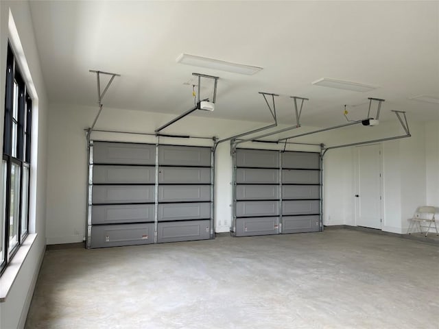 1754 County Road 146th Rd, Georgetown, TX 78633 - garage featuring a garage door opener