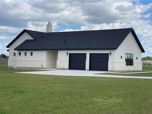 1754 County Road 146th Rd, Georgetown, TX 78633 - back of property with roof with shingles, board and batten siding, a lawn, and a chimney