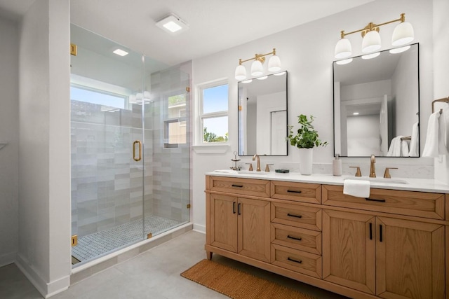 1417 Charolais Dr, Austin, TX 78758 - full bathroom with double vanity, a stall shower, and baseboards