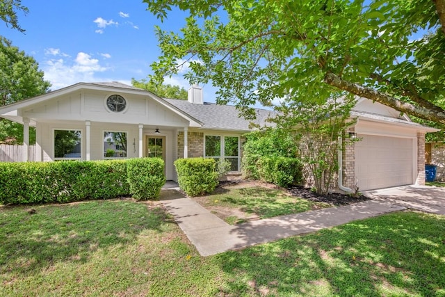 1417 Charolais Dr, Austin, TX 78758 - ranch-style house with a front lawn, a garage, a chimney, and driveway