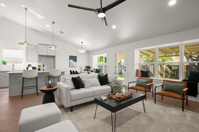 1417 Charolais Dr, Austin, TX 78758 - living room featuring lofted ceiling, light wood-style floors, recessed lighting, and a ceiling fan