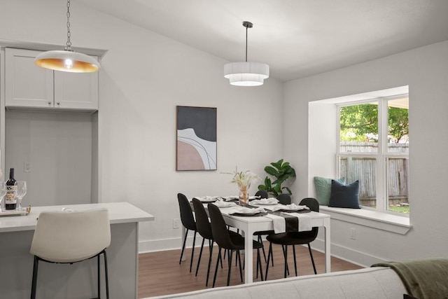 1417 Charolais Dr, Austin, TX 78758 - dining area featuring baseboards and dark wood-style floors