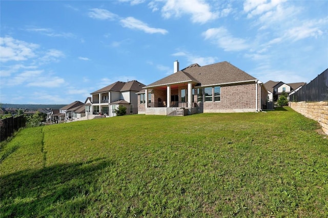 2032 Murano Ln, Leander, TX 78641 - rear view of property with brick siding, a chimney, and cooling unit