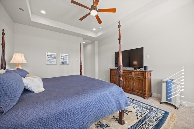 2032 Murano Ln, Leander, TX 78641 - bedroom with light colored carpet, recessed lighting, ceiling fan, baseboards, and a raised ceiling
