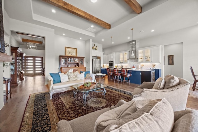2032 Murano Ln, Leander, TX 78641 - living room with beam ceiling, wood-type flooring, recessed lighting, and baseboards