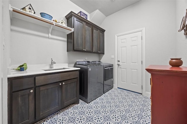 2032 Murano Ln, Leander, TX 78641 - laundry area with separate washer and dryer and cabinet space