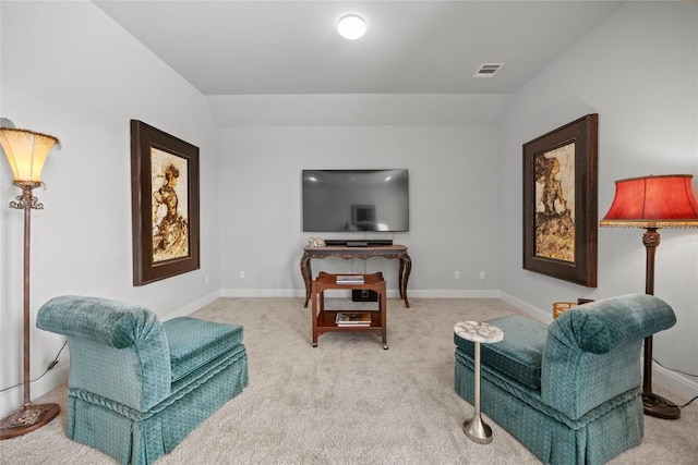 2032 Murano Ln, Leander, TX 78641 - carpeted living area featuring vaulted ceiling and baseboards