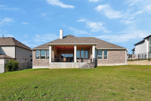 2032 Murano Ln, Leander, TX 78641 - rear view of house with brick siding and a chimney