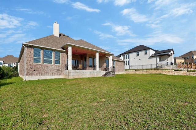 2032 Murano Ln, Leander, TX 78641 - rear view of property featuring brick siding, a chimney, and a residential view