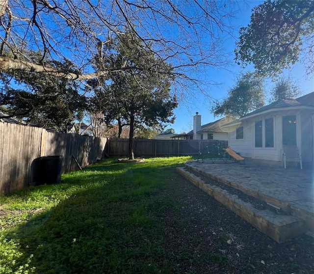 view of yard with a patio area