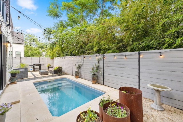 1111 Walton Ln Unit 2, Austin, TX 78721 - view of pool featuring a fenced backyard and a patio