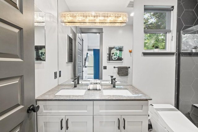 1111 Walton Ln Unit 2, Austin, TX 78721 - full bath with double vanity and toilet